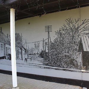 Billede af murmaleri fra Åsted. Denne har by som tema.